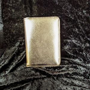 Shiny rose gold passport wallet
